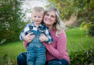Professional Portrait of a mom and her young son taken in a park 