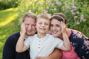 Family Photo of a Seven-year-old boy with his parents at Beckman Mills in Beloit, Wisconsin,