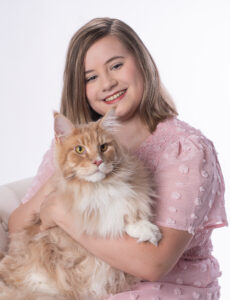 Family photos with a girl and her cat.