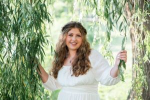 Beautiful portrait of a high school senior photographed by Life in Pink Photography at Beckman Mill.