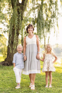 Family Portrait of Grandmother with two young grandchildren taken at Riverside Park.